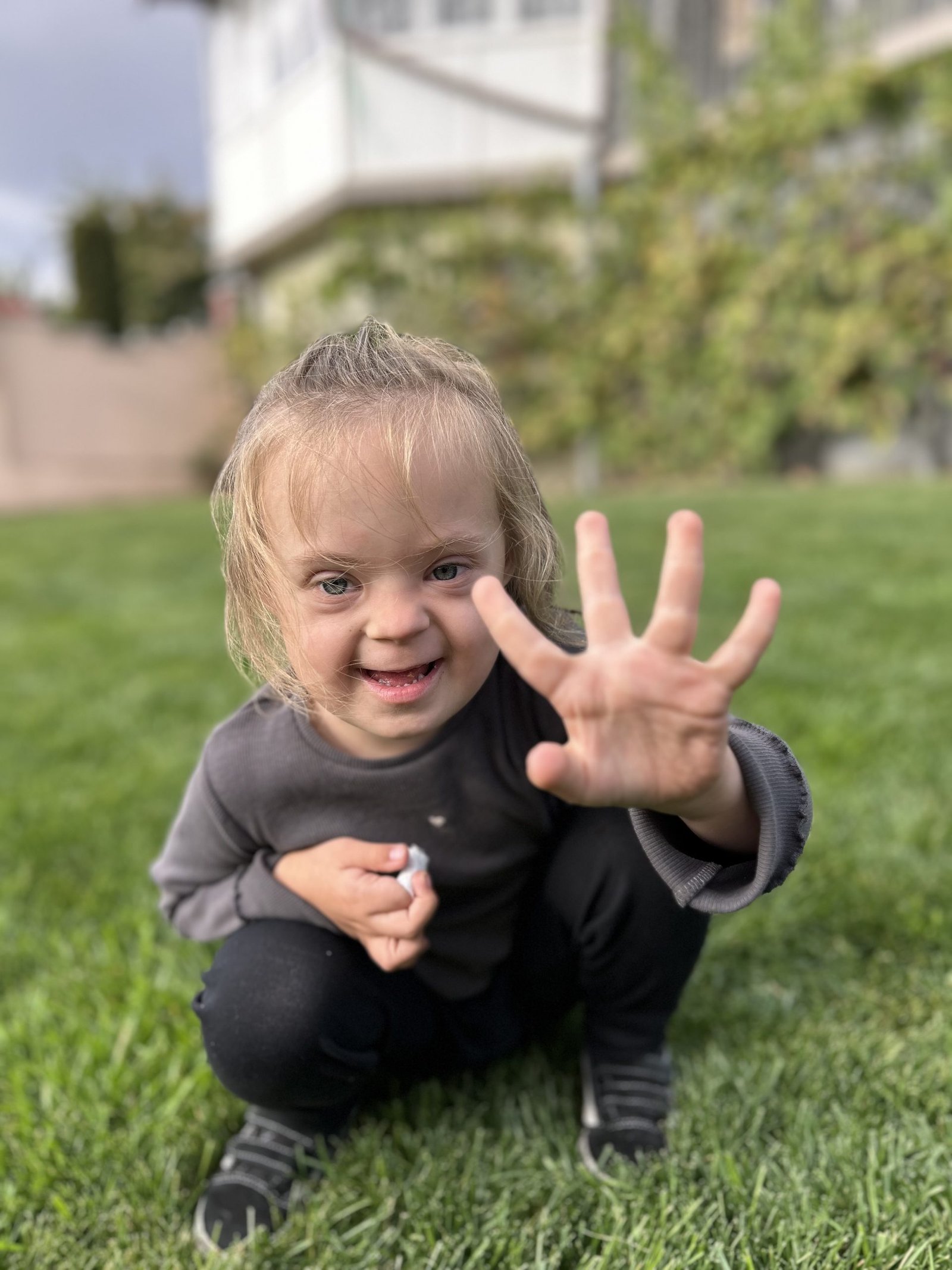 A girl playing in a garden