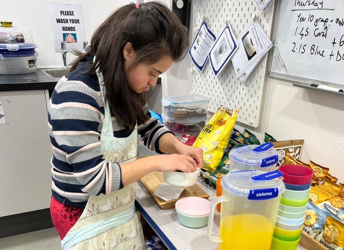 Teen girl cooking