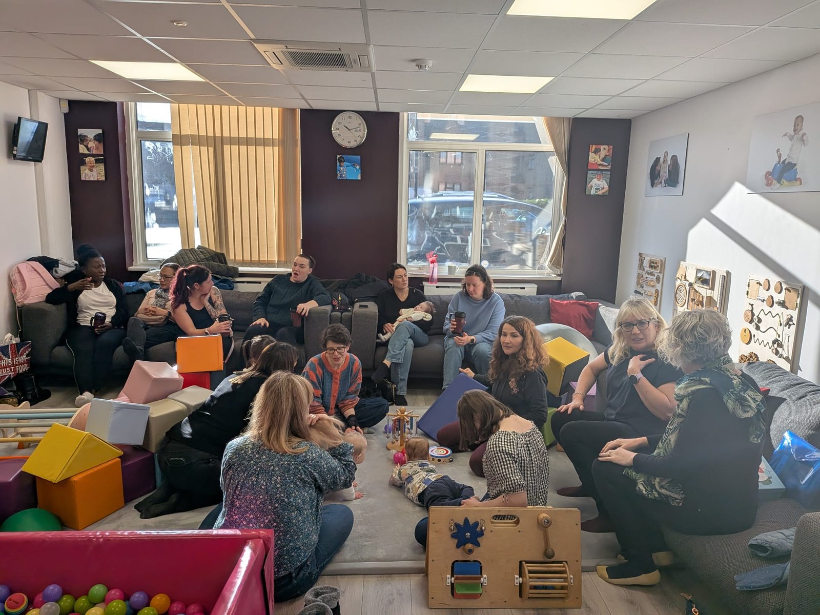 Parents and children gathered at a Get On Downs weekly meetup session